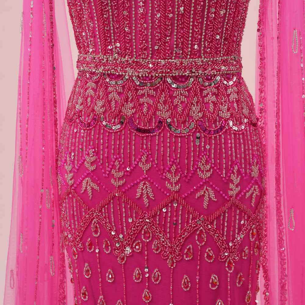 
                      
                        Hot Pink Beaded Long Dress with Cape Sleeves
                      
                    