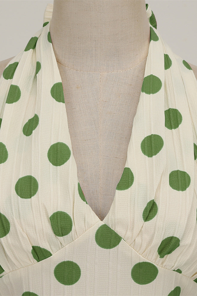 
                      
                        Green Polka Dots 1950s Halter Big Swing Dress
                      
                    