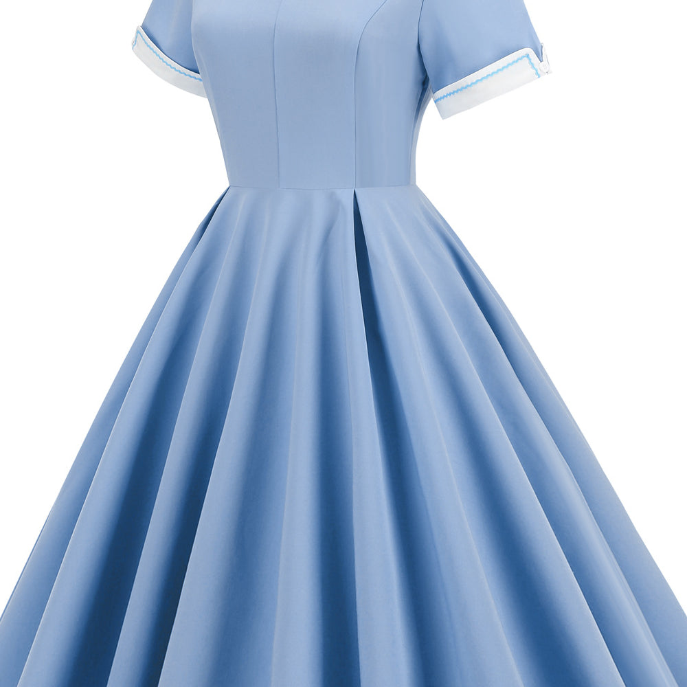 
                      
                        Light Blue 1950s Button Front Swing Dress with Pockets
                      
                    