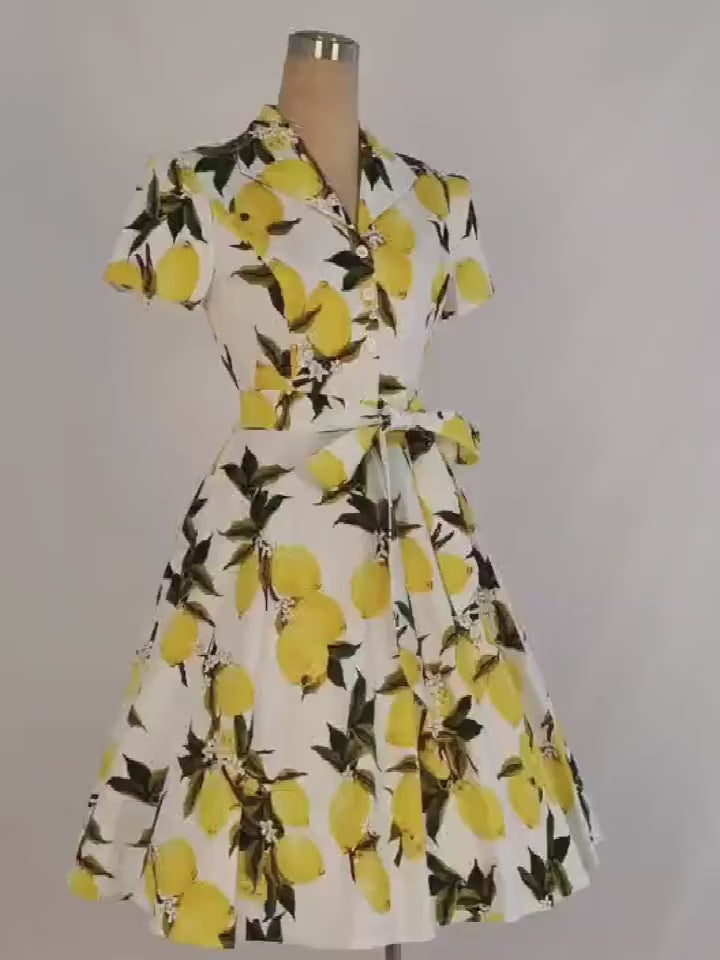 
                      
                        Load and play video in Gallery viewer, White 1950s Plant Print Belted Vintage Swing Dress
                      
                    